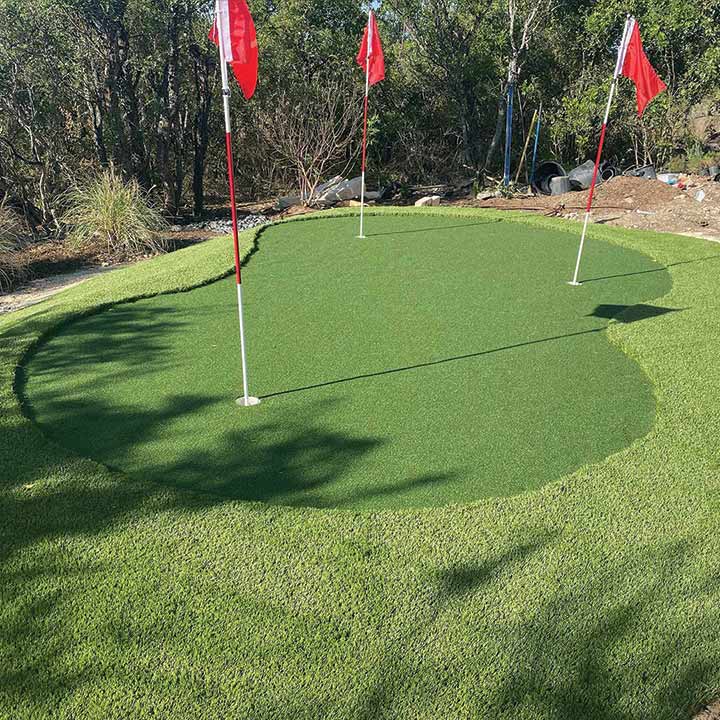 putting green installed in a backyard