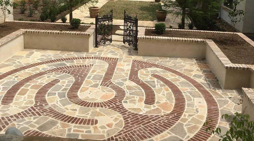 stamped concrete design with a gated walk way